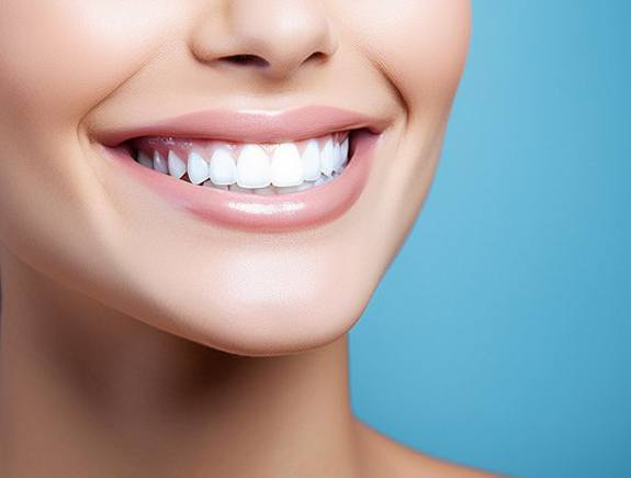 a person smiling with bright teeth