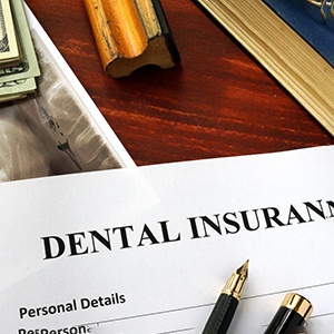 Dental insurance form lying on a table