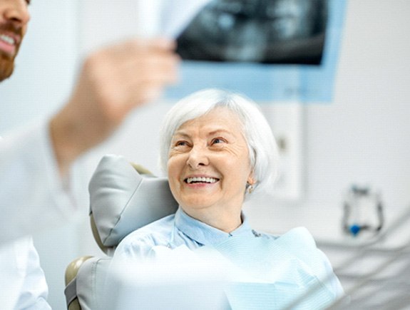 patient talking to dentist 