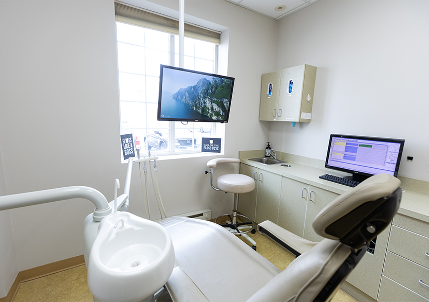 Empty dental chair in West Caldwell dental office