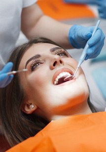 patient visiting dentist for checkup 