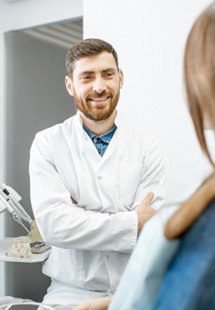 dentist talking to patient about sleep apnea