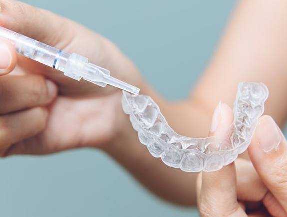 Before and after teeth whitening